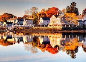 houses-in-new-england-in-the-fall-GettyImages-513394375-1300w-867h