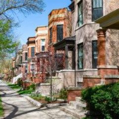 row-of-brick-homes-gettyimages-1162825043-1300w-867h