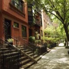 brownstones-tree-lined-street-GettyImages-500753331-1300w-867h