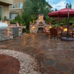 paver-patio-with-fire_pit-gettyimages-183593525-03-16-2023-1300w-867h