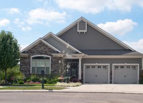 gray-house-with-two-car-garage-gettyimages-181707643-1300w-867h