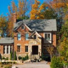 brick-house-in-autumn-GettyImages-472069091-1300w-867h