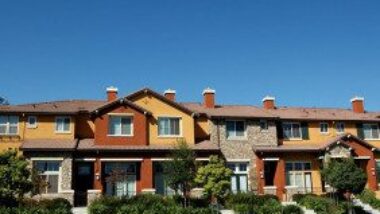 row-of-townhomes-gettyimages-116006796-1300w-867h